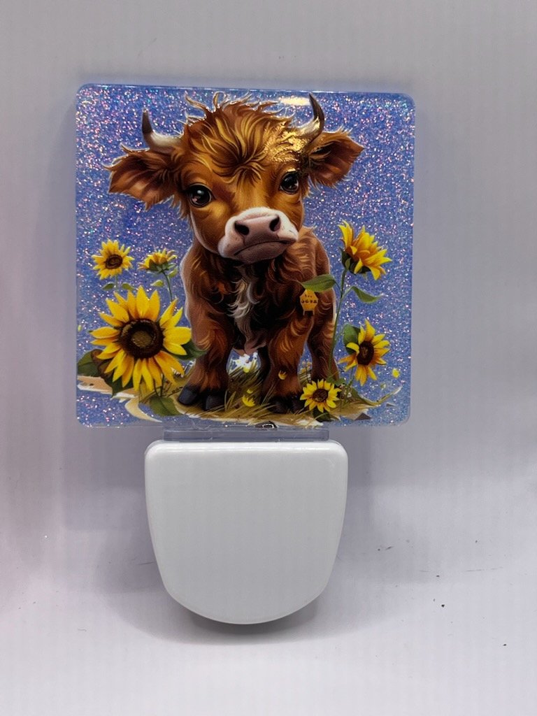 calf with sunflowers