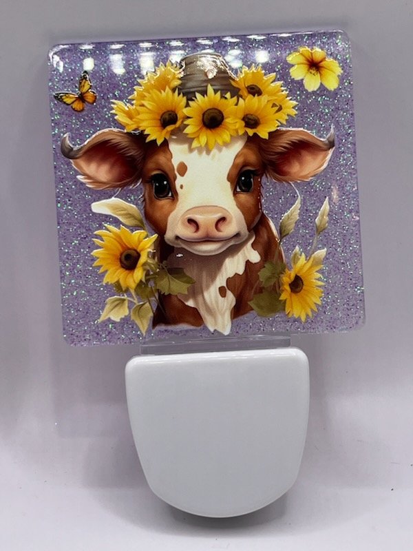 calf with sunflowers on head